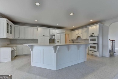 Welcome to this gorgeous 4 bed / 3.5 bath, BRICK, MASTER ON MAIN on Laurel Springs Golf Club in Georgia - for sale on GolfHomes.com, golf home, golf lot