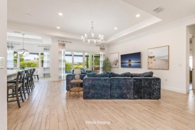 Sleek, smart, and solar-powered--this lavishly upgraded custom on Bent Pine Golf Club in Florida - for sale on GolfHomes.com, golf home, golf lot