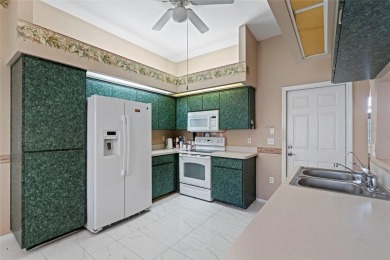 Prime location and move-in ready, this 2-bedroom, 2-bath villa on Seven Springs Golf and Country Club in Florida - for sale on GolfHomes.com, golf home, golf lot