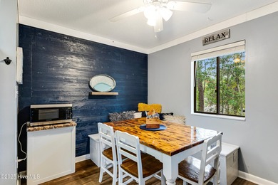 Stylish 2 bedroom, 2 bath condo in the heart of downtown on Carolina Shores Golf Course in North Carolina - for sale on GolfHomes.com, golf home, golf lot