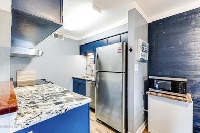 Stylish 2 bedroom, 2 bath condo in the heart of downtown on Carolina Shores Golf Course in North Carolina - for sale on GolfHomes.com, golf home, golf lot