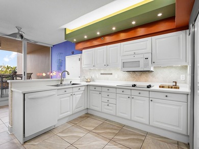 Beautifully positioned within Grand Bay on Longboat Key, this on Longboat Key Golf Club Resort in Florida - for sale on GolfHomes.com, golf home, golf lot