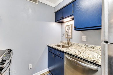 Stylish 2 bedroom, 2 bath condo in the heart of downtown on Carolina Shores Golf Course in North Carolina - for sale on GolfHomes.com, golf home, golf lot