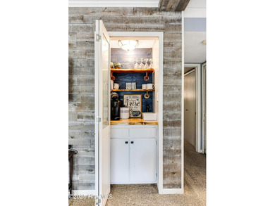 Stylish 2 bedroom, 2 bath condo in the heart of downtown on Carolina Shores Golf Course in North Carolina - for sale on GolfHomes.com, golf home, golf lot