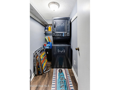 Stylish 2 bedroom, 2 bath condo in the heart of downtown on Carolina Shores Golf Course in North Carolina - for sale on GolfHomes.com, golf home, golf lot