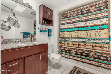 Experience the charm and comfort of this single-story home w/ on Quail Run Golf Course in Arizona - for sale on GolfHomes.com, golf home, golf lot