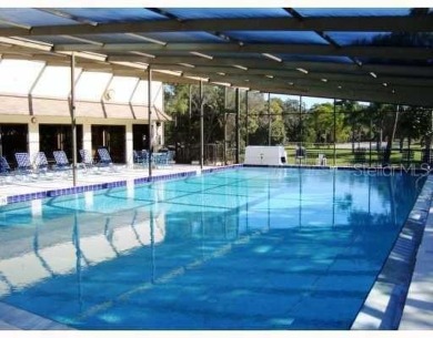 IRONWOOD.  NOT 55+.  2BR/2BA 5th. Floor End Unit Home.  Elevator on Pinebrook/Ironwood Golf Course in Florida - for sale on GolfHomes.com, golf home, golf lot