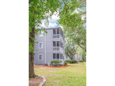 Stylish 2 bedroom, 2 bath condo in the heart of downtown on Carolina Shores Golf Course in North Carolina - for sale on GolfHomes.com, golf home, golf lot