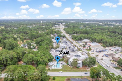 Stylish 2 bedroom, 2 bath condo in the heart of downtown on Carolina Shores Golf Course in North Carolina - for sale on GolfHomes.com, golf home, golf lot