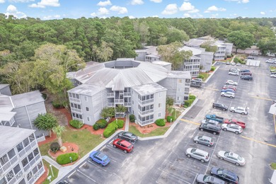 Stylish 2 bedroom, 2 bath condo in the heart of downtown on Carolina Shores Golf Course in North Carolina - for sale on GolfHomes.com, golf home, golf lot