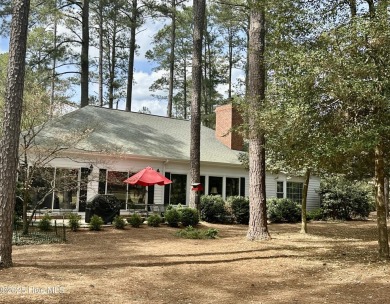 Enjoy the views of the third hole of Pinewild's Azalea course on Pinewild Country Club of Pinehurst in North Carolina - for sale on GolfHomes.com, golf home, golf lot