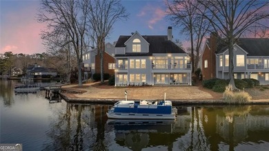 LIVE LIKE YOU ARE ON VACATION on Lake Windward with private dock on The Golf Club of Georgia in Georgia - for sale on GolfHomes.com, golf home, golf lot