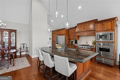 LIVE LIKE YOU ARE ON VACATION on Lake Windward with private dock on The Golf Club of Georgia in Georgia - for sale on GolfHomes.com, golf home, golf lot