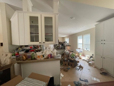 Great opportunity! Sold as is, cash only. Handyman special needs on Savanna Golf Club in Florida - for sale on GolfHomes.com, golf home, golf lot