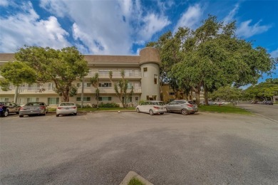 Light, bright and impeccably updated! This 3rd floor corner unit on On Top Of The World Golf Course in Florida - for sale on GolfHomes.com, golf home, golf lot