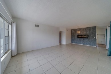 Light, bright and impeccably updated! This 3rd floor corner unit on On Top Of The World Golf Course in Florida - for sale on GolfHomes.com, golf home, golf lot
