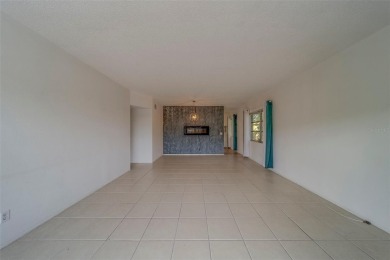 Light, bright and impeccably updated! This 3rd floor corner unit on On Top Of The World Golf Course in Florida - for sale on GolfHomes.com, golf home, golf lot