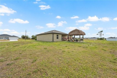 Escape the cold to the perfect SUNNY retreat in Northwest Cape on Burnt Store Golf Club in Florida - for sale on GolfHomes.com, golf home, golf lot