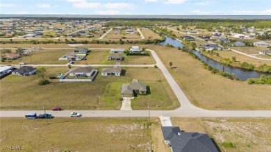 Escape the cold to the perfect SUNNY retreat in Northwest Cape on Burnt Store Golf Club in Florida - for sale on GolfHomes.com, golf home, golf lot
