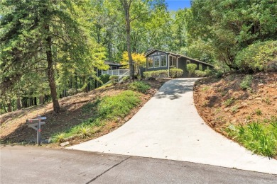 Beautiful seasonal water views! Located on 2 lots on a quiet on Keowee Key Golf and Country Club in South Carolina - for sale on GolfHomes.com, golf home, golf lot
