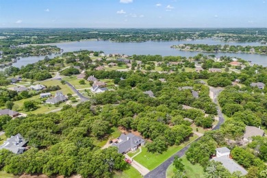 Welcome to this stunning custom-built home tucked inside the on Lake Kiowa Golf Course in Texas - for sale on GolfHomes.com, golf home, golf lot