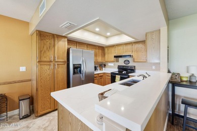 Welcome to this nicely furnished patio home in the popular 55+ on Fountain of the Sun Country Club in Arizona - for sale on GolfHomes.com, golf home, golf lot