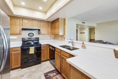 Welcome to this nicely furnished patio home in the popular 55+ on Fountain of the Sun Country Club in Arizona - for sale on GolfHomes.com, golf home, golf lot