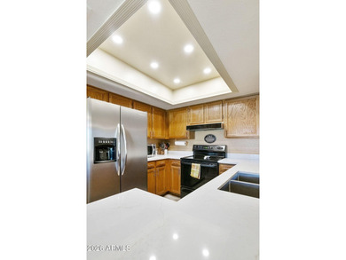 Welcome to this nicely furnished patio home in the popular 55+ on Fountain of the Sun Country Club in Arizona - for sale on GolfHomes.com, golf home, golf lot