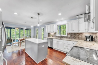 Beautiful seasonal water views! Located on 2 lots on a quiet on Keowee Key Golf and Country Club in South Carolina - for sale on GolfHomes.com, golf home, golf lot
