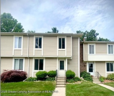 Tucked in a dream Haslett location, this stylish 3-bedroom condo on Lake O The Hills Golf Course in Michigan - for sale on GolfHomes.com, golf home, golf lot