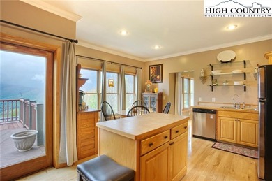 Sunset views, solar power, and space for everyone--this on Mountain Aire Golf Course in North Carolina - for sale on GolfHomes.com, golf home, golf lot