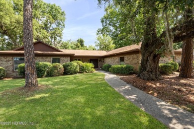 Nestled in a serene setting, this charming home offers a perfect on Blue Cypress Golf Club in Florida - for sale on GolfHomes.com, golf home, golf lot
