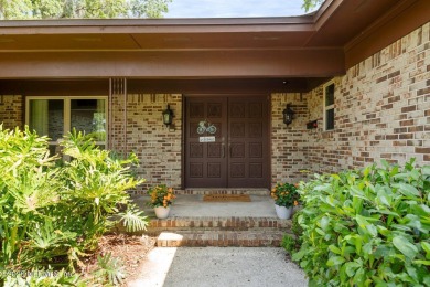 Nestled in a serene setting, this charming home offers a perfect on Blue Cypress Golf Club in Florida - for sale on GolfHomes.com, golf home, golf lot