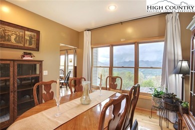 Sunset views, solar power, and space for everyone--this on Mountain Aire Golf Course in North Carolina - for sale on GolfHomes.com, golf home, golf lot