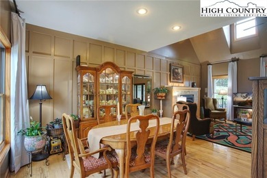 Sunset views, solar power, and space for everyone--this on Mountain Aire Golf Course in North Carolina - for sale on GolfHomes.com, golf home, golf lot