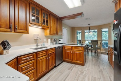 Nestled in a serene setting, this charming home offers a perfect on Blue Cypress Golf Club in Florida - for sale on GolfHomes.com, golf home, golf lot