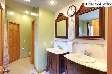 Sunset views, solar power, and space for everyone--this on Mountain Aire Golf Course in North Carolina - for sale on GolfHomes.com, golf home, golf lot