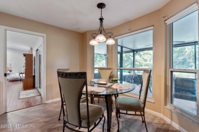 Nestled in a serene setting, this charming home offers a perfect on Blue Cypress Golf Club in Florida - for sale on GolfHomes.com, golf home, golf lot