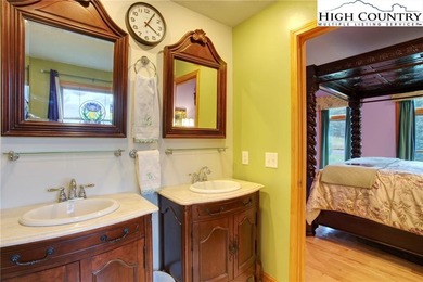 Sunset views, solar power, and space for everyone--this on Mountain Aire Golf Course in North Carolina - for sale on GolfHomes.com, golf home, golf lot