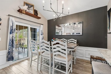 Tucked within the guard-gated community of Hunter's Green on Hunters Green Country Club in Florida - for sale on GolfHomes.com, golf home, golf lot