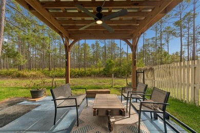 Tucked within the guard-gated community of Hunter's Green on Hunters Green Country Club in Florida - for sale on GolfHomes.com, golf home, golf lot