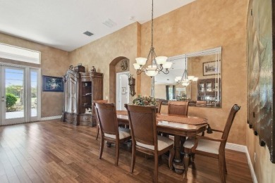 Stunning Former Model Home with Golf Course  Conservation Views on River Hills Country Club in Florida - for sale on GolfHomes.com, golf home, golf lot