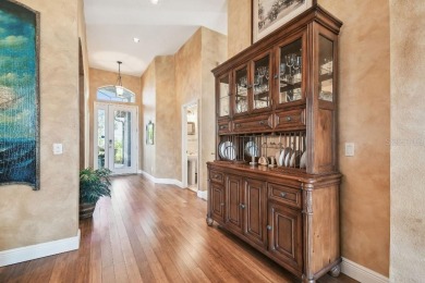 Stunning Former Model Home with Golf Course  Conservation Views on River Hills Country Club in Florida - for sale on GolfHomes.com, golf home, golf lot