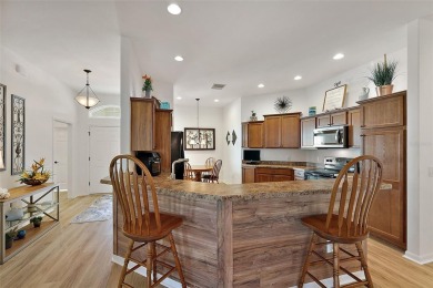 Welcome to this stunning 3/2 Begonia model with a 2-Car plus on Pennbrooke Fairways in Florida - for sale on GolfHomes.com, golf home, golf lot