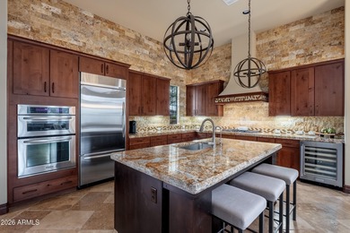 Sophisticated lock-and-leave living in an amenity-rich enclave on The Country Club At DC Ranch in Arizona - for sale on GolfHomes.com, golf home, golf lot