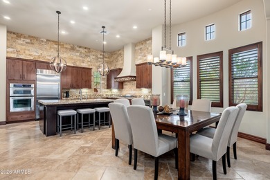 Sophisticated lock-and-leave living in an amenity-rich enclave on The Country Club At DC Ranch in Arizona - for sale on GolfHomes.com, golf home, golf lot