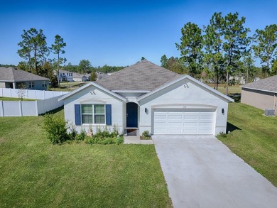 Welcome to this beautifully crafted, nearly brand-new home on Lake Diamond Golf and Country Club in Florida - for sale on GolfHomes.com, golf home, golf lot