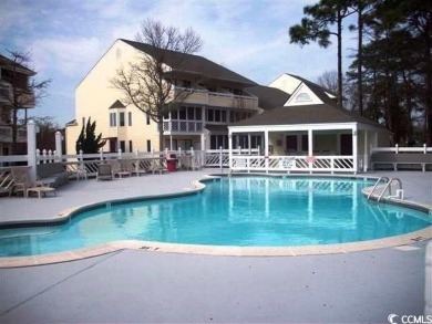 Enjoy coastal living at NMB Golf & Tennis! This furnished NMB on Possum Trot Golf Course in South Carolina - for sale on GolfHomes.com, golf home, golf lot