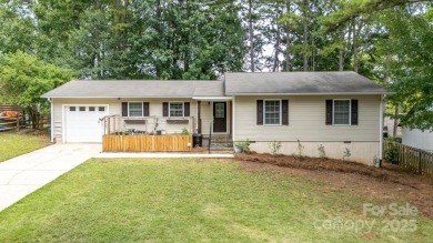 Lake view, large flat yard, fully updated, and truly move-in on Tega Cay Golf Club in South Carolina - for sale on GolfHomes.com, golf home, golf lot