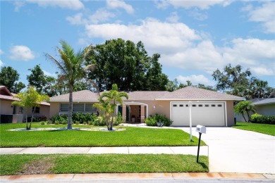 FULLY FURNISHED! Welcome to 8060 Canterbury Chase, Largo on Bayou Golf Club in Florida - for sale on GolfHomes.com, golf home, golf lot
